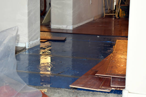 Professional Storm Water Damage Restoration technician working in Central Falls, RI